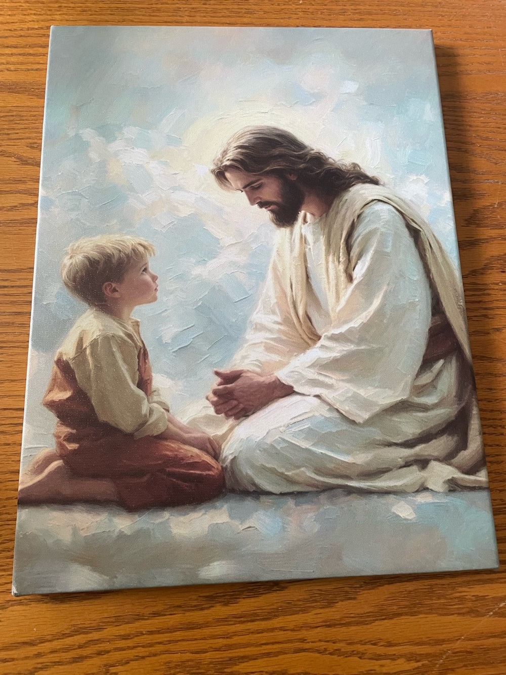 Canvas painting of Jesus and little boy